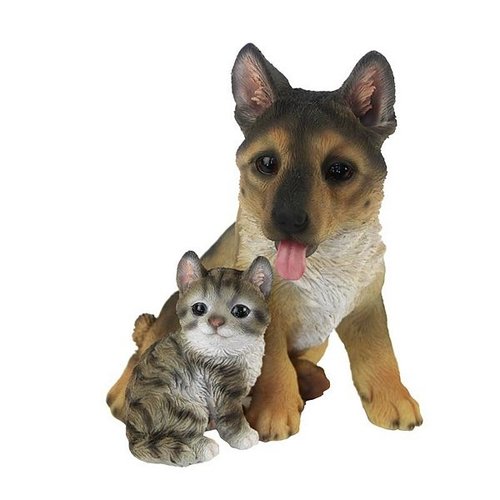 Herder pup met kitten zittend